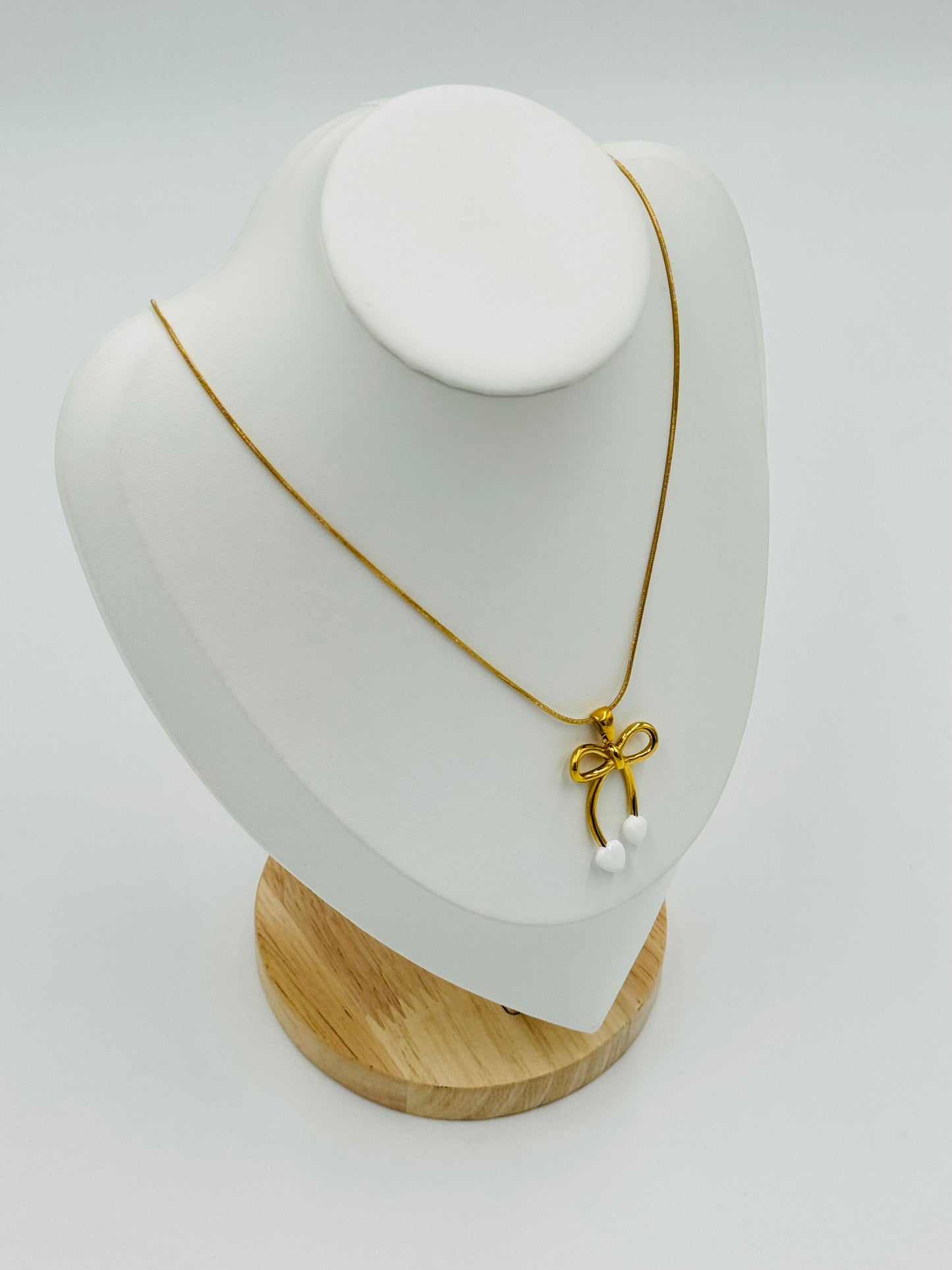 Elegant Ribbon Bow Necklace – 18K Gold Plated with Pearl Drop, Hypoallergenic