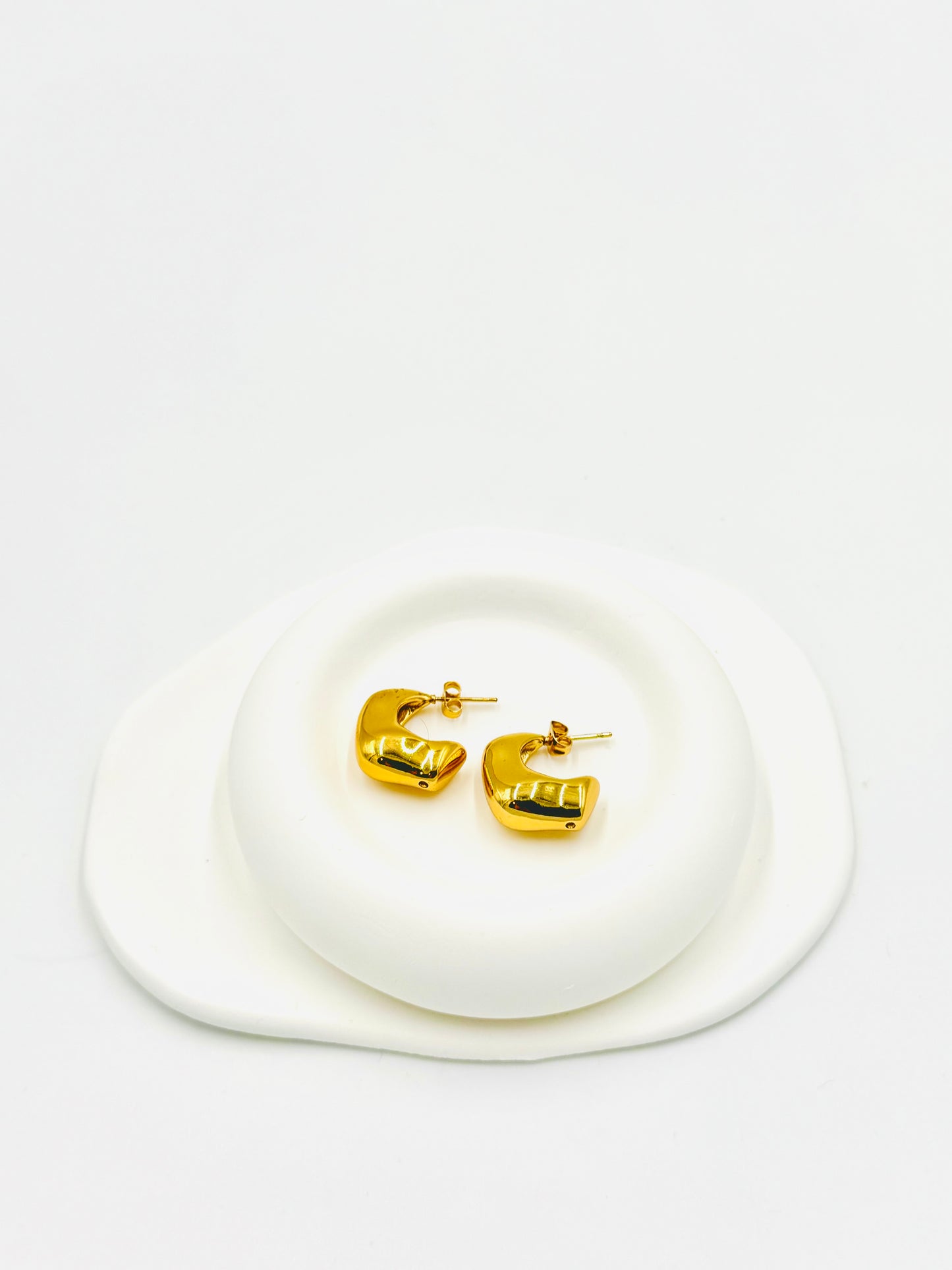 Bold Curve Mini Hoop Earrings
